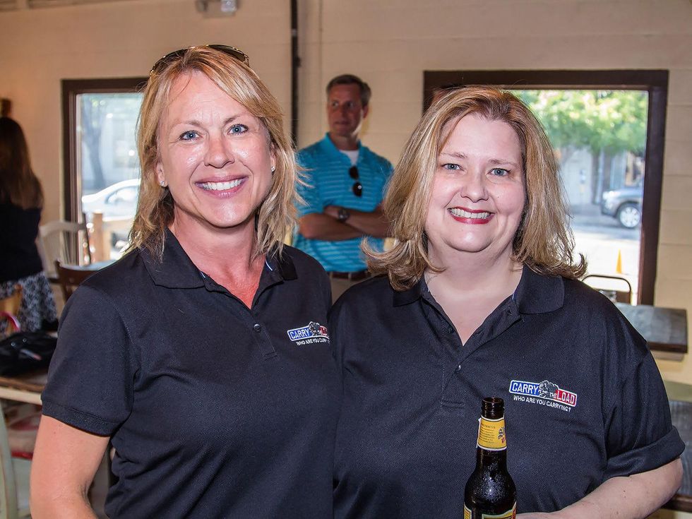 Judy Rawlinson, Margaret LeDeere at Carry The Load fundraiser dinner at Pecan Lodge