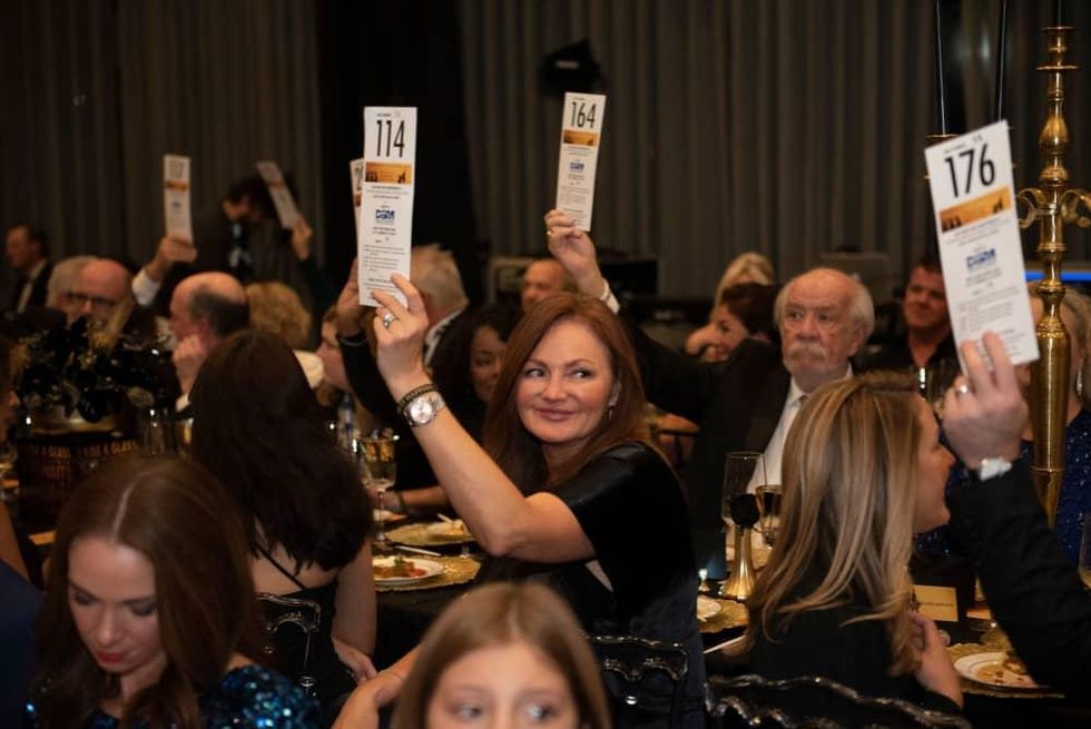 Kellie Rasberry Evans at the DSM 2021 Gala silent auction