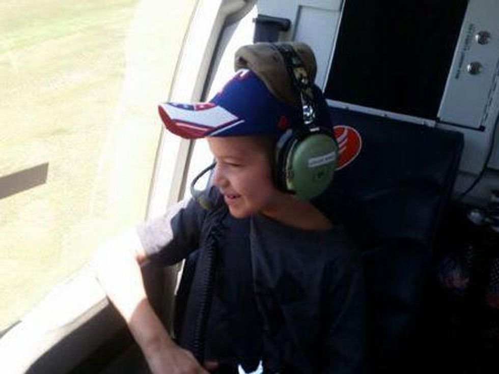 Kid rides in helicopter