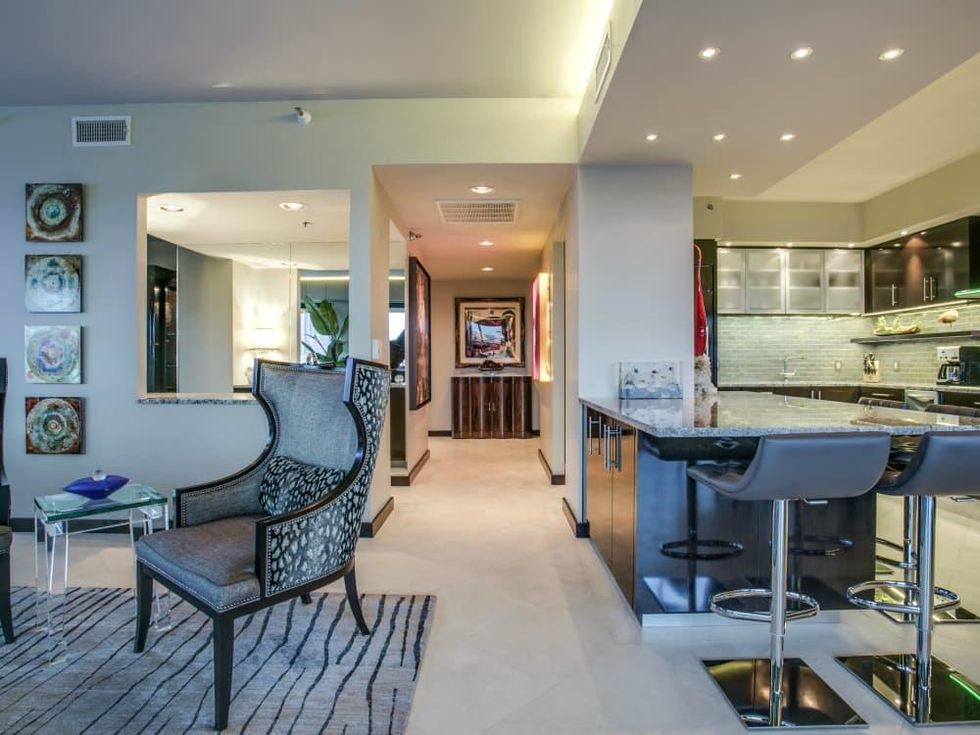 Kitchen and living area at 3831 Turtle Creek Blvd. in Dallas