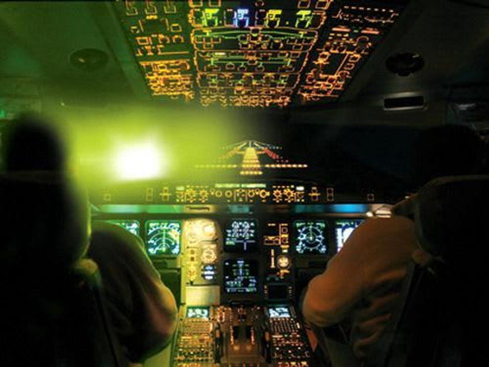 Laser pointer hits plane