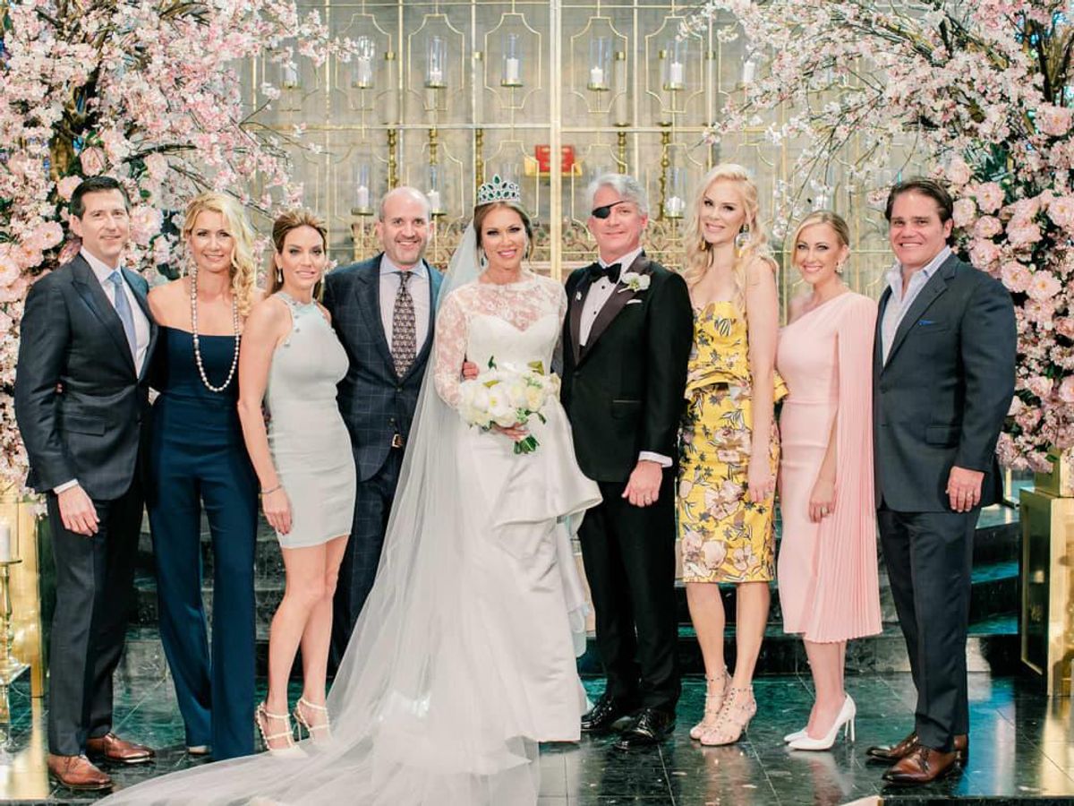 The bride and groom with RHOD castmates and spouses Eduardo and Kary
