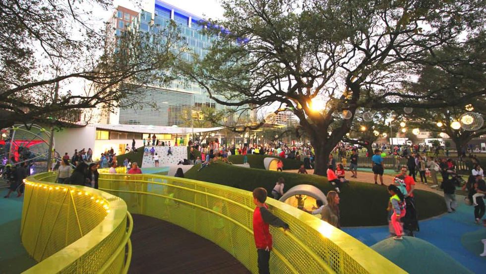 Levy Park Houston oak tree park child