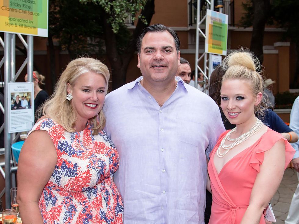 Lisa Ogle, Bill Ogle, Jordan Roberts, taca party on the green