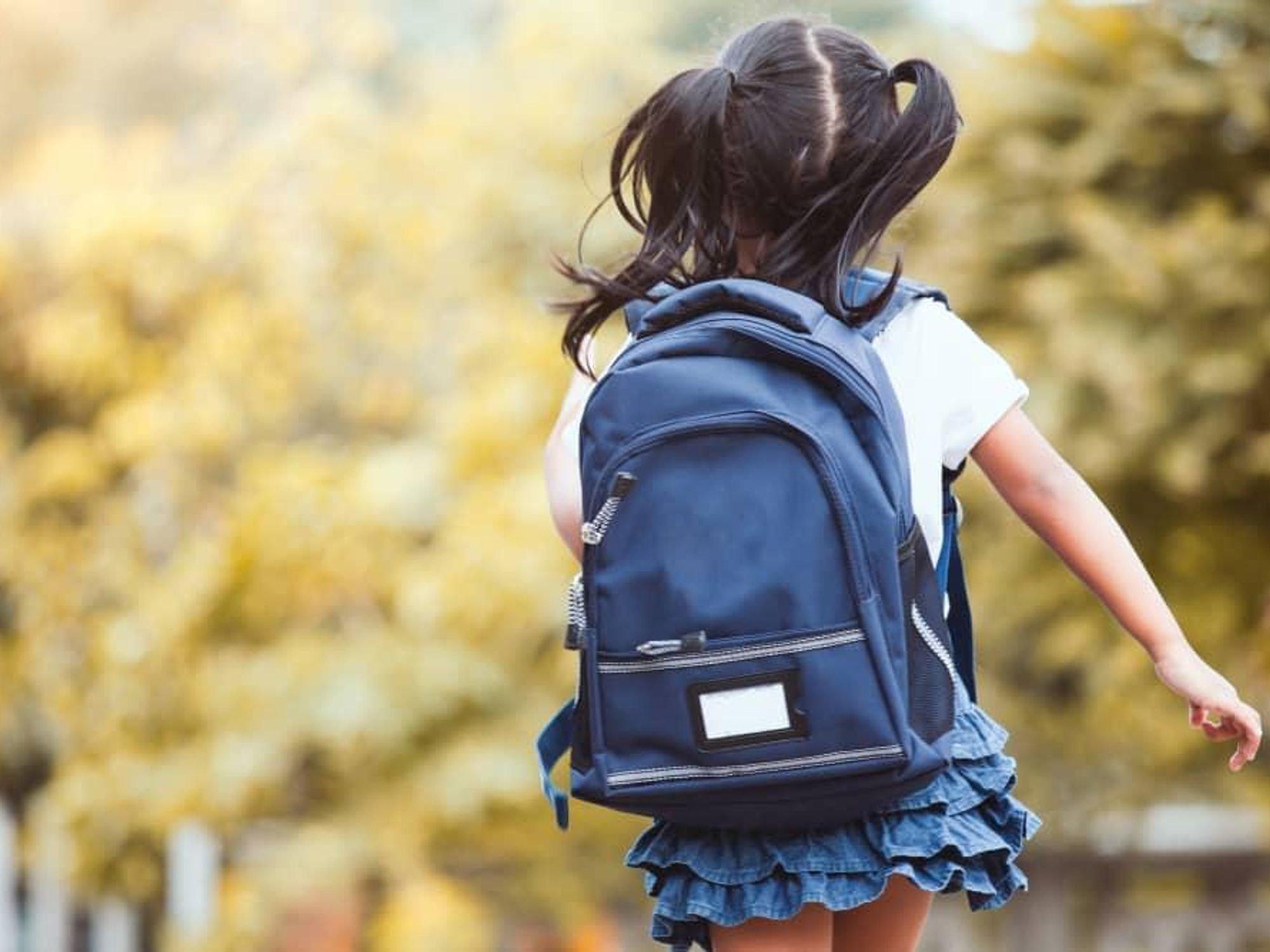 Little girl with backpack