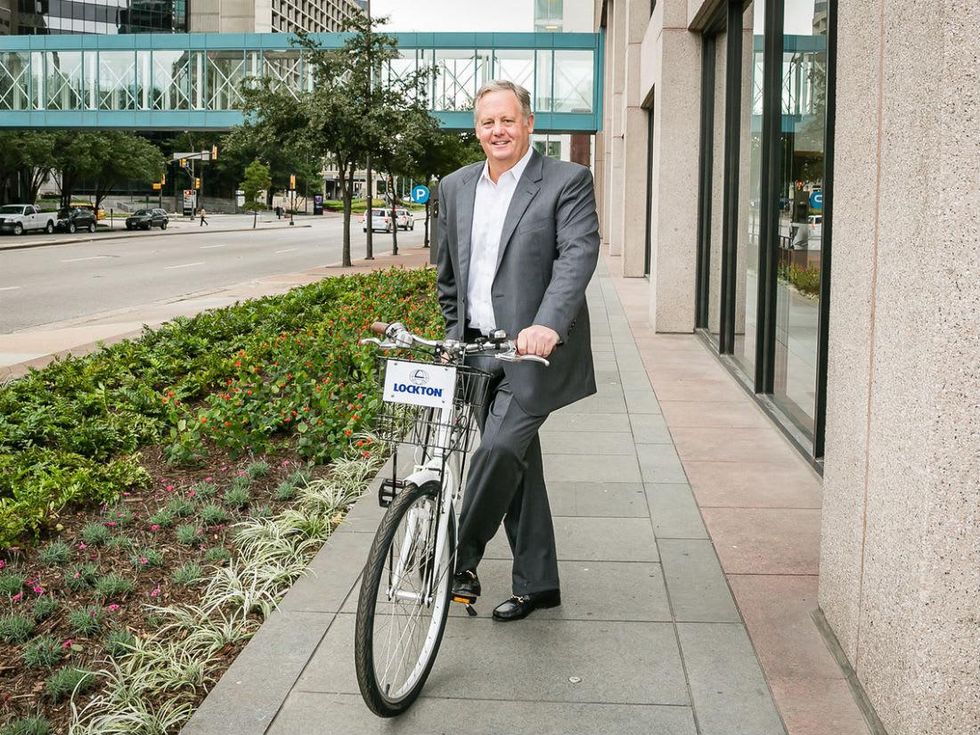 Lockton Companies CEO Bruce Sammis with Zagster bicycle