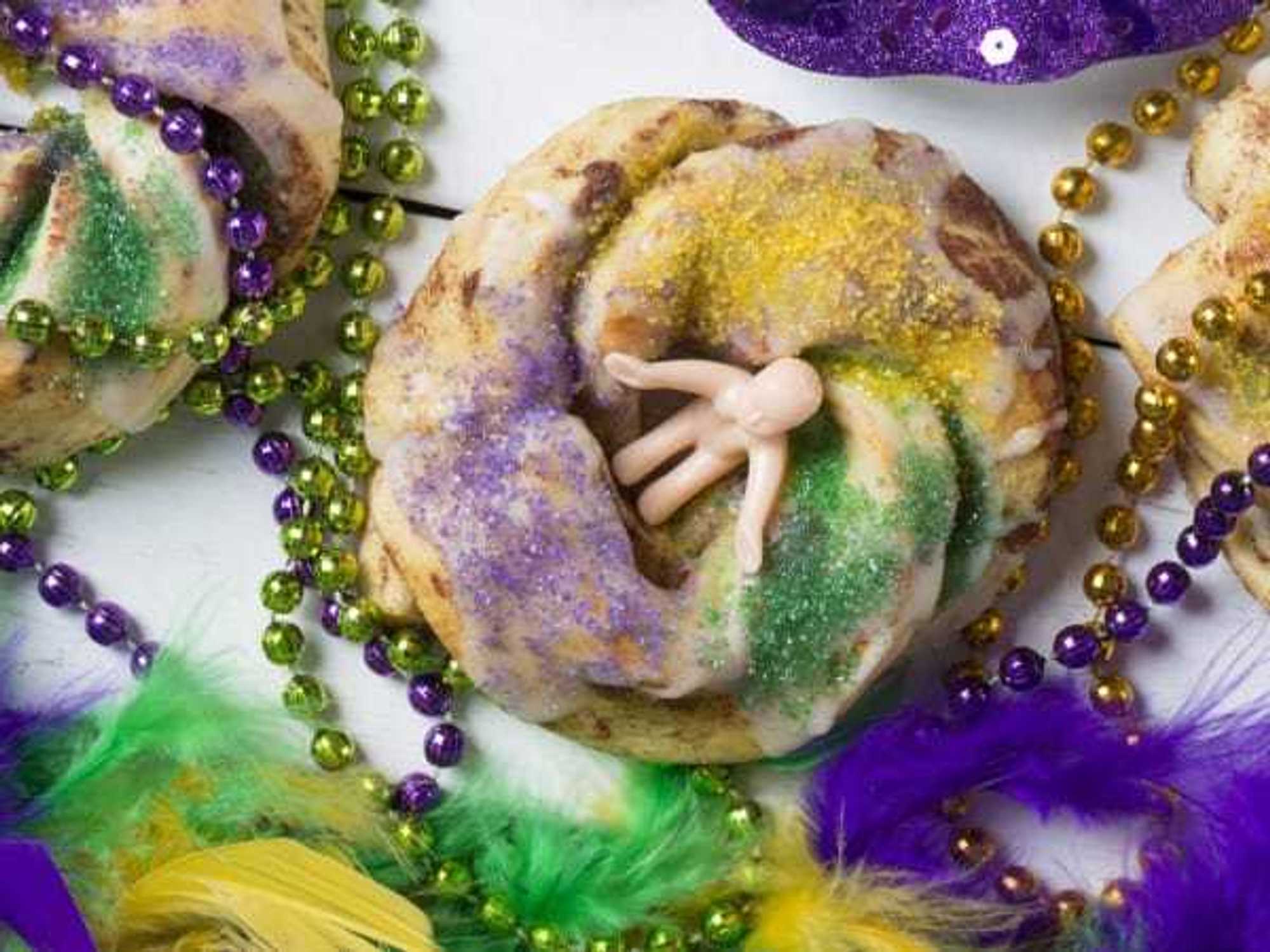 Mardi Gras King Cakes, Masks, Beads, and Coins