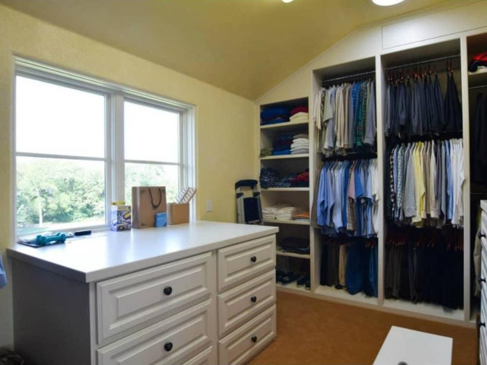 Master closet at 12258 Creek Forest Dr. in Dallas