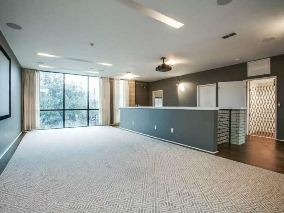 Media room at 4321 Travis St. in Dallas