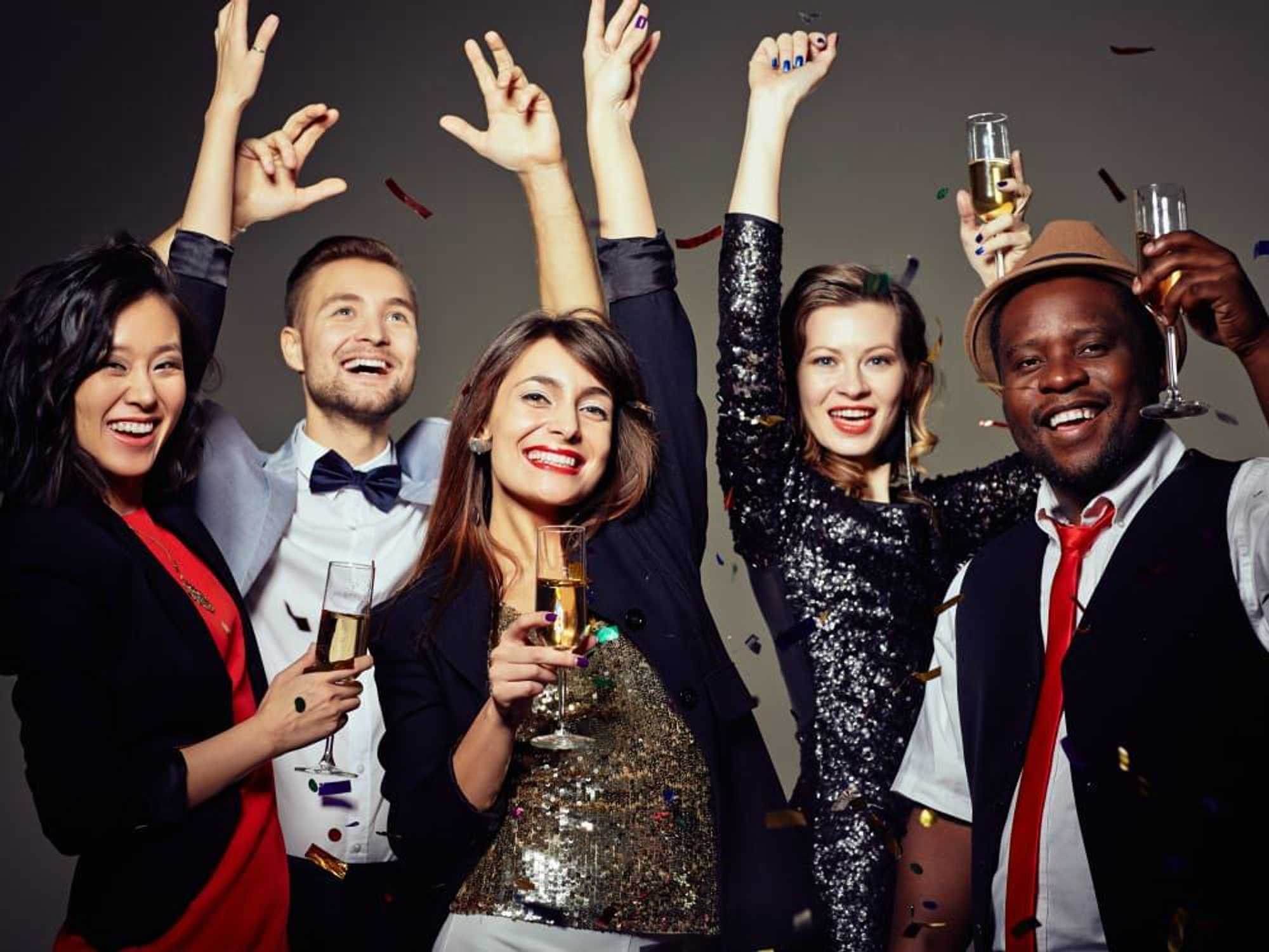 Men and women celebrating New Year's Eve