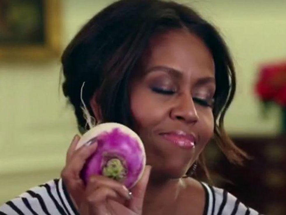 Michelle Obama dances with turnip