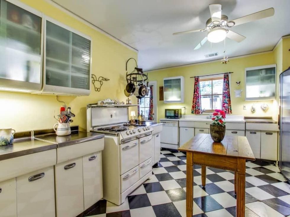 Midcentury stainless steel cabinets at 6469 Sondra Ln. in Dallas