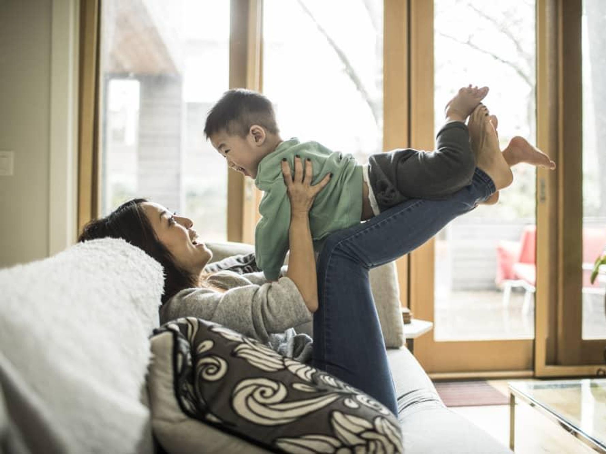 Mom and baby laughing