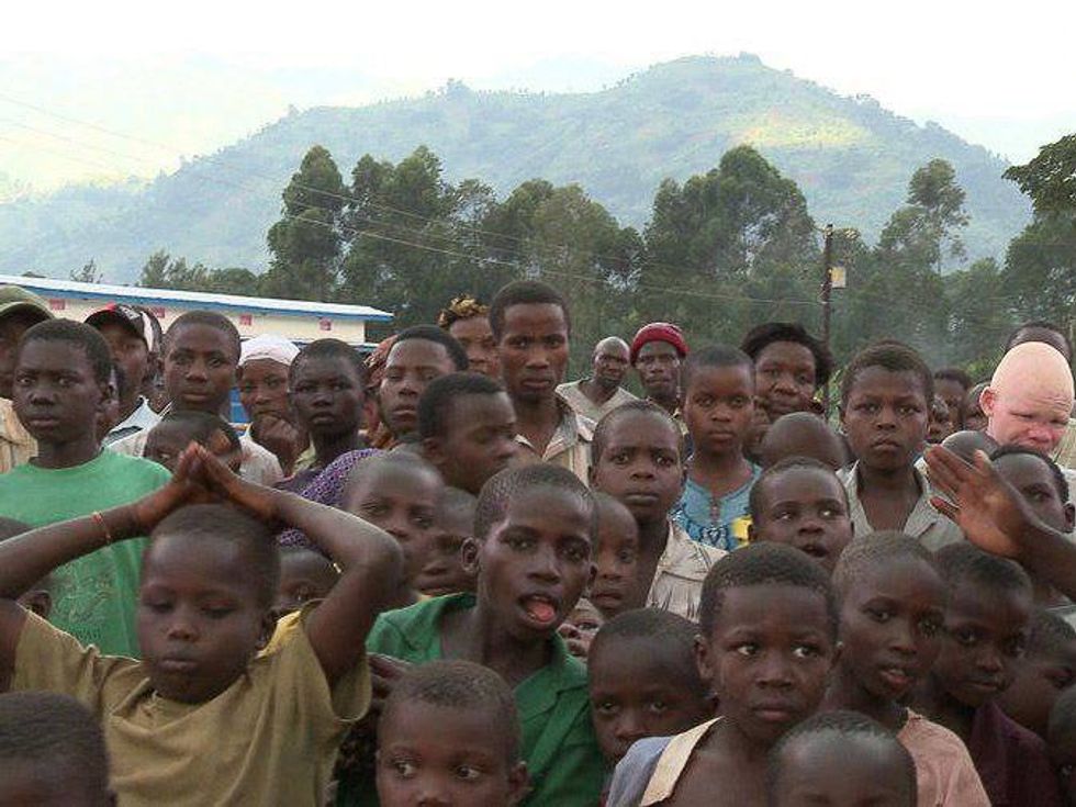 Mondo Cinema, Greedy Lying Bastards, Residents of the displacement camp created for survivors of the devastating March 2010 mudslide that buried three villages killing nearly 100. Bududa District, Eastern Uganda, 2010