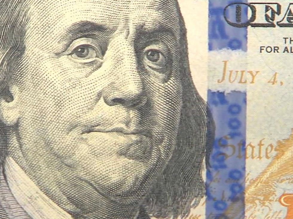 new $100 bill with George Washington closeup