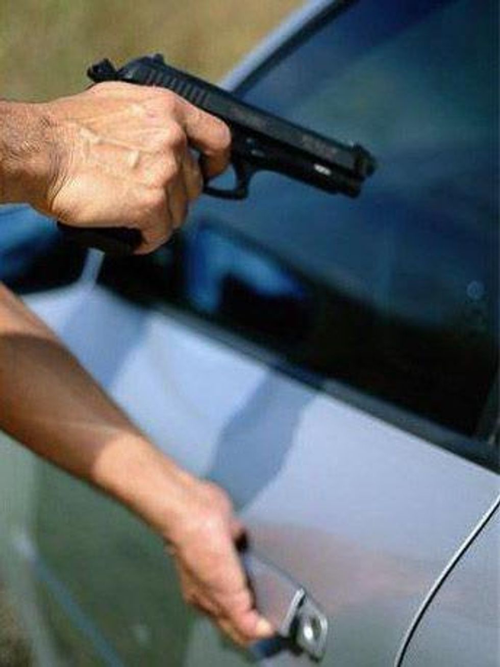 News_carjacking_man_gun