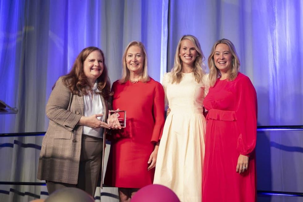 Paige McDaniel, Peggy Sewell, Josie Sewell, Jacqueline Sewell with 2021 Partners for Children Award presented to the Sewell Family