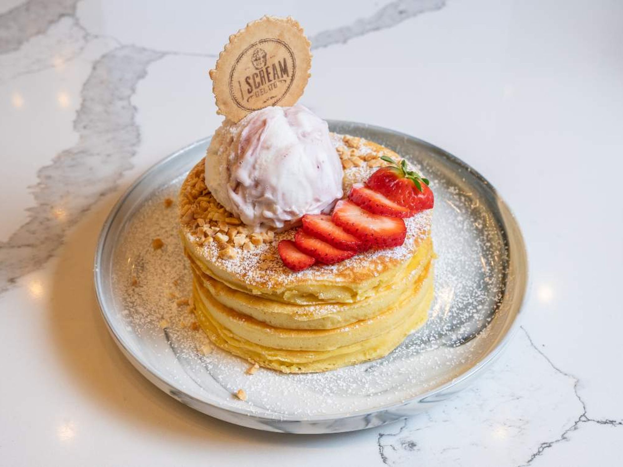 Pancakes topped with gelato