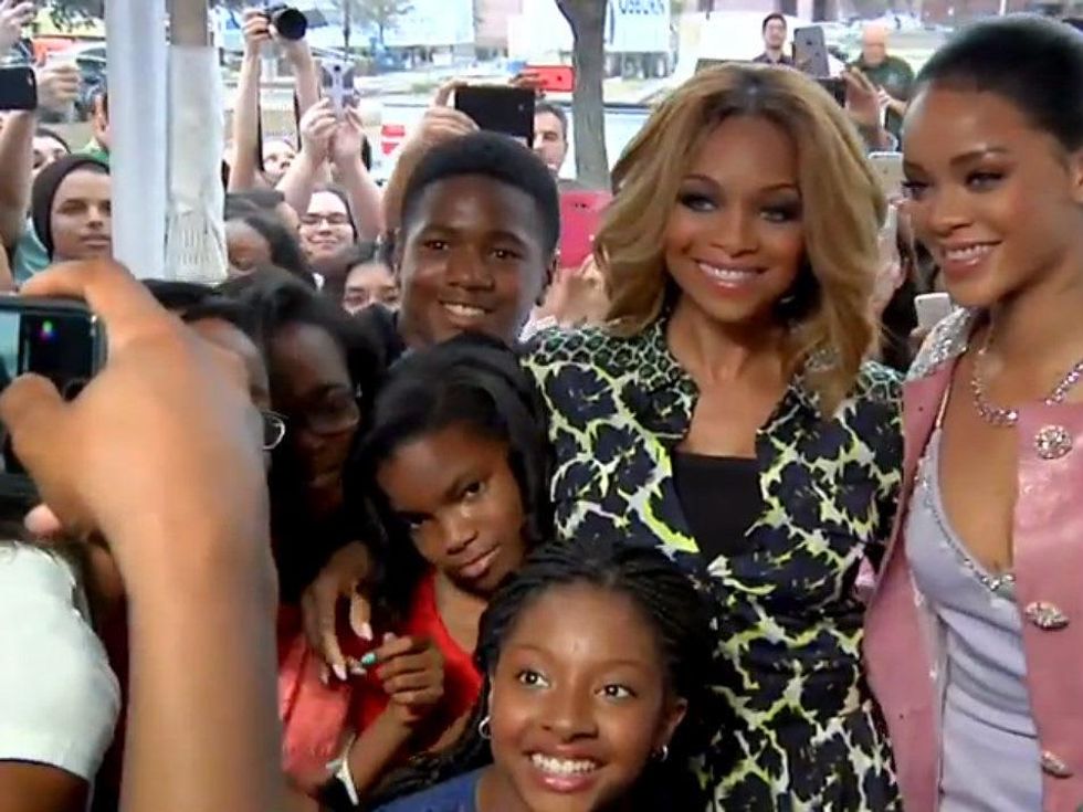 Pat Smith and Rihanna on red carpet at Home premiere