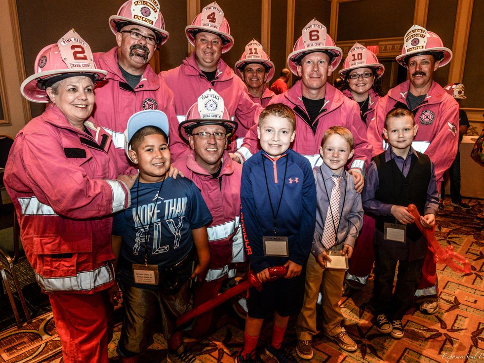 Pink Heals Firefighters with kids backstage, children's cancer fund luncheon