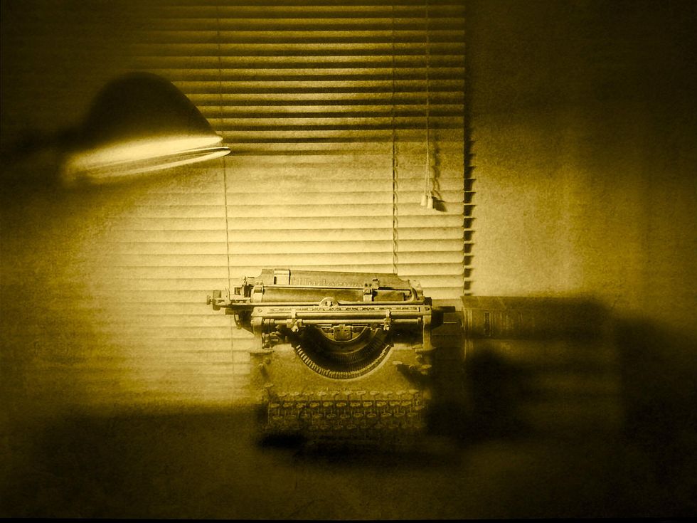 Platinum palladium over gold leaf print, "Typewriter and Lamp," by Dan Burkholder