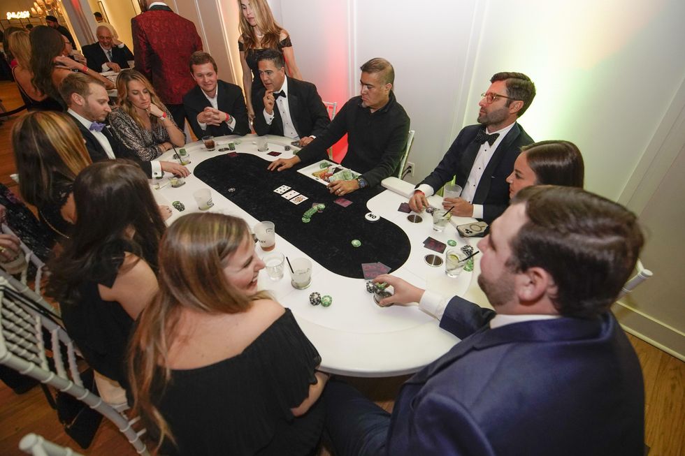 Playing cards at the VIP tables at CASAblanca 2023
