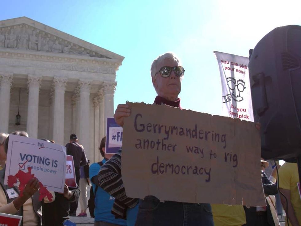 Protestors in Slay the Dragon