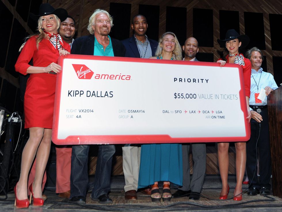 Richard Branson presents a check to KIPP DFW