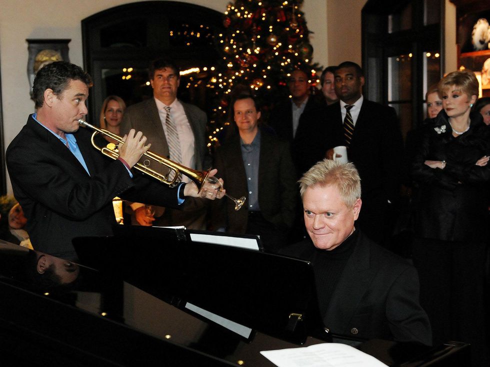 Ryan Anthony improvises with a wine glass "mute"