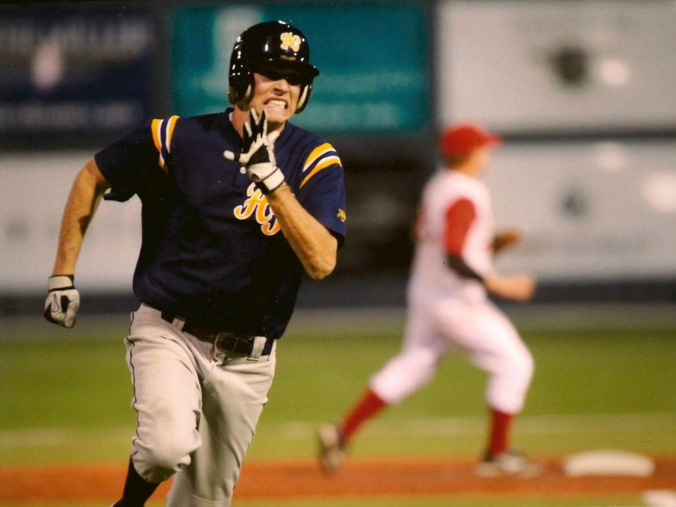 Ryan Romo playing baseball for Highland Park High School