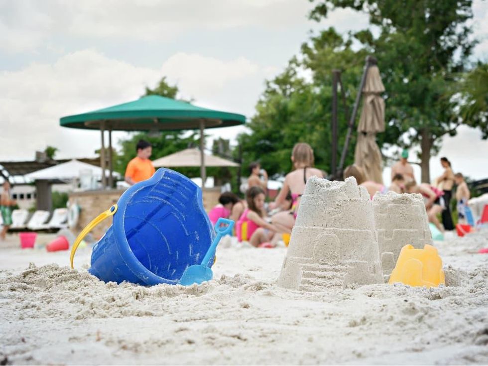 Sand castle building and dive in moves at Four Seasons Dallas