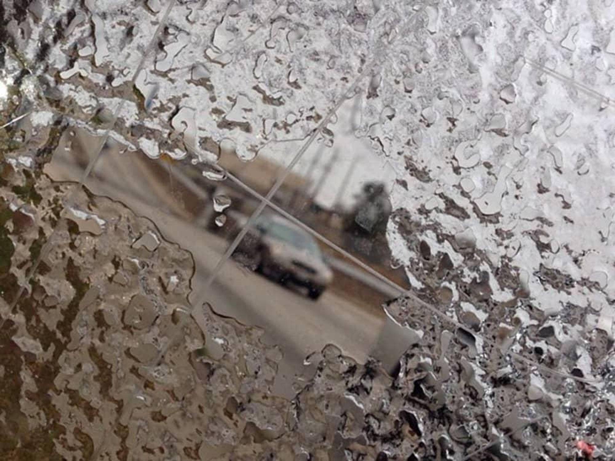 snow Houston ice car windshield