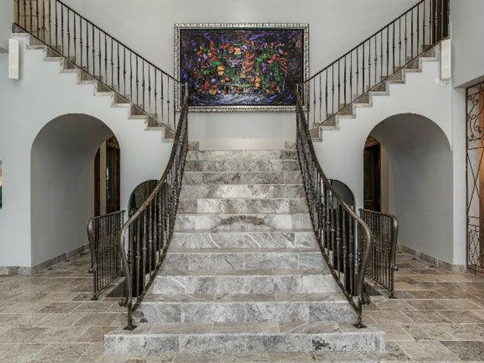 Split staircase at 8211 Inwood Rd. in Dallas