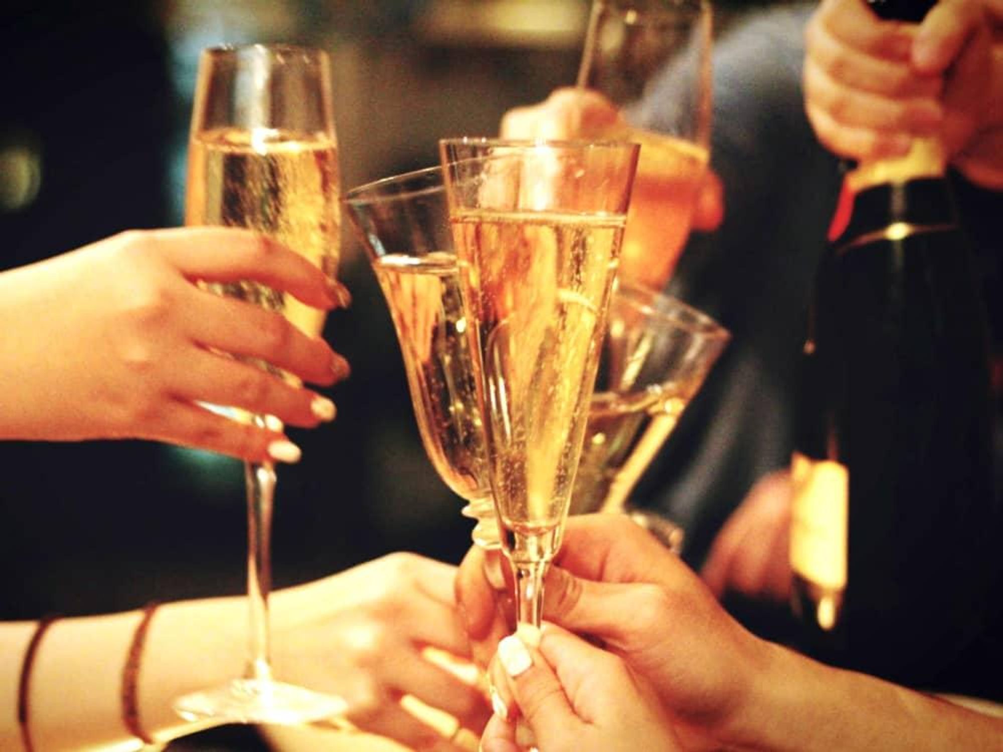 https://dallas.culturemap.com/media-library/stock-photo-of-friends-toasting-champagne.jpg?id=31497194&width=2000&height=1500&quality=85&coordinates=0%2C0%2C0%2C0