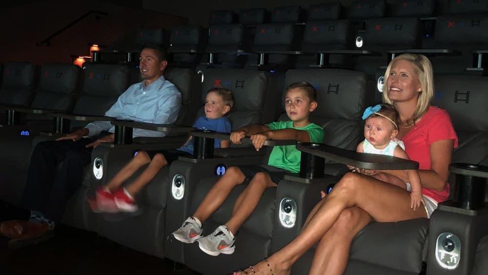 Strike + Reel movie theater with family
