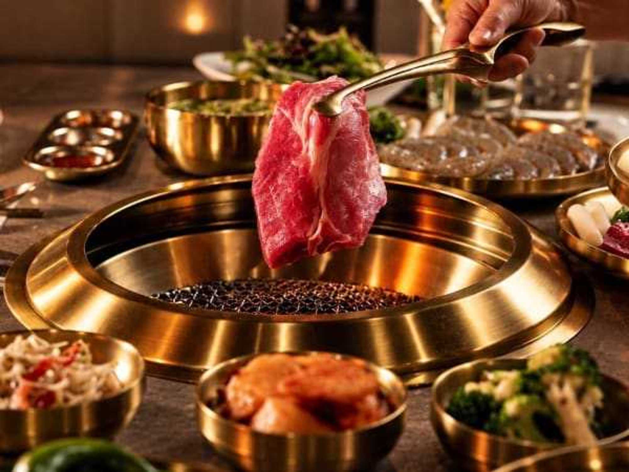 Tableside-ready prime beef will be served with Korean side dishes, dipping sauces, and fresh garnishes.
