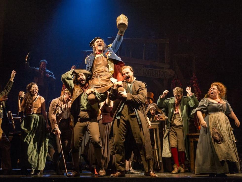 The company of Les Miserables performs \u201cMaster of the House\u201d with J Anthony Crane as Th\u00e9nardier and Allison Guinn as Madame Th\u00e9nardier