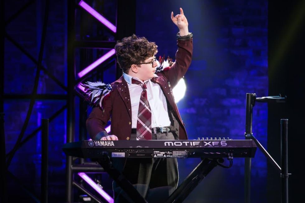 Theo Mitchell-Penner in the School of Rock Tour