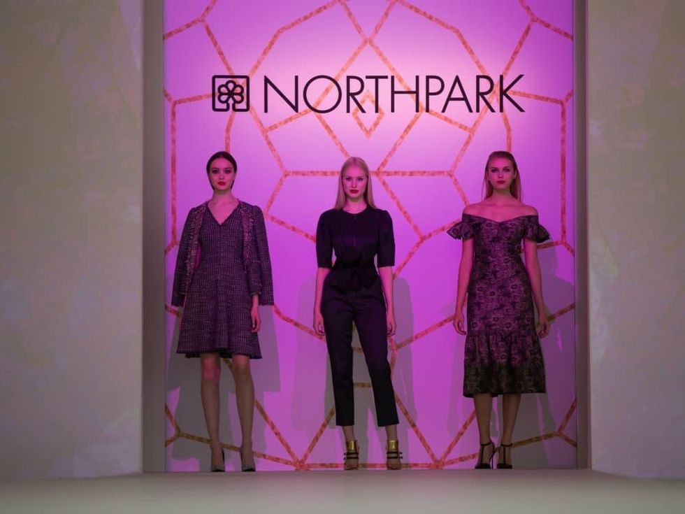 Three models on the runway