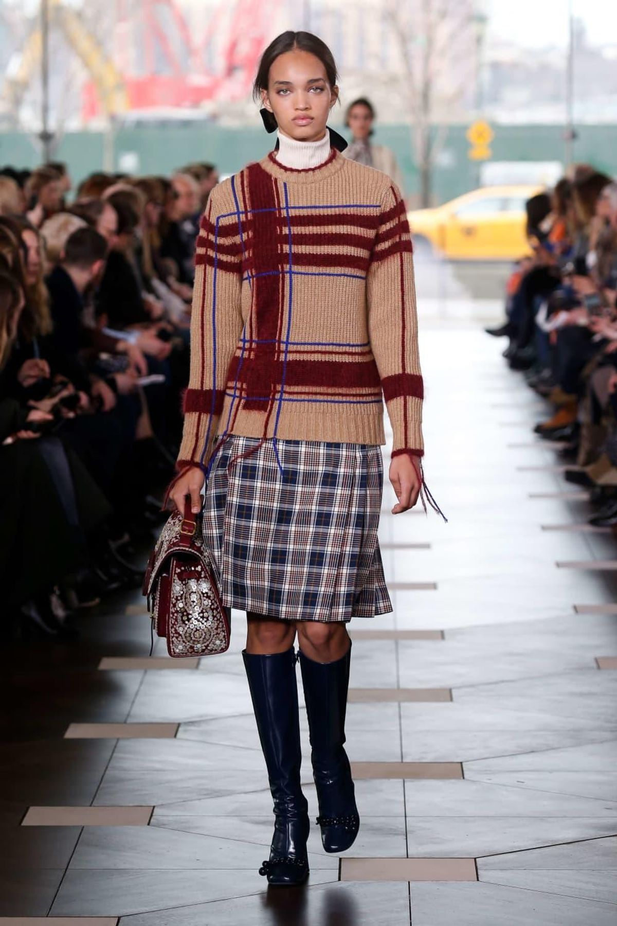 Tory Burch plaid-pattern merino sweater, viscose turtleneck, and Main Line- plaid tech twill skirt. - CultureMap Dallas