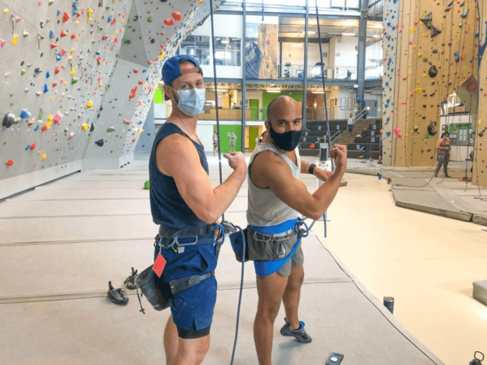 Two men at climbing gym