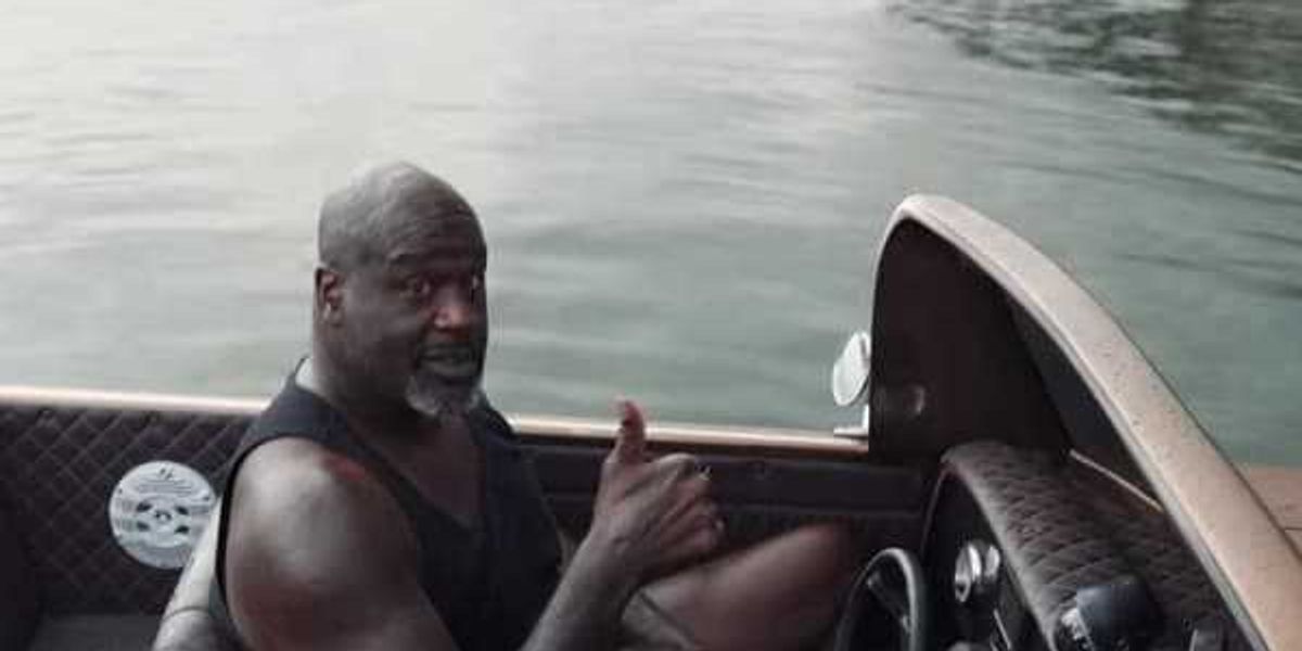 Shaquille O'Neal cruises Dallas lake in custom '64 Chevy Impala boat