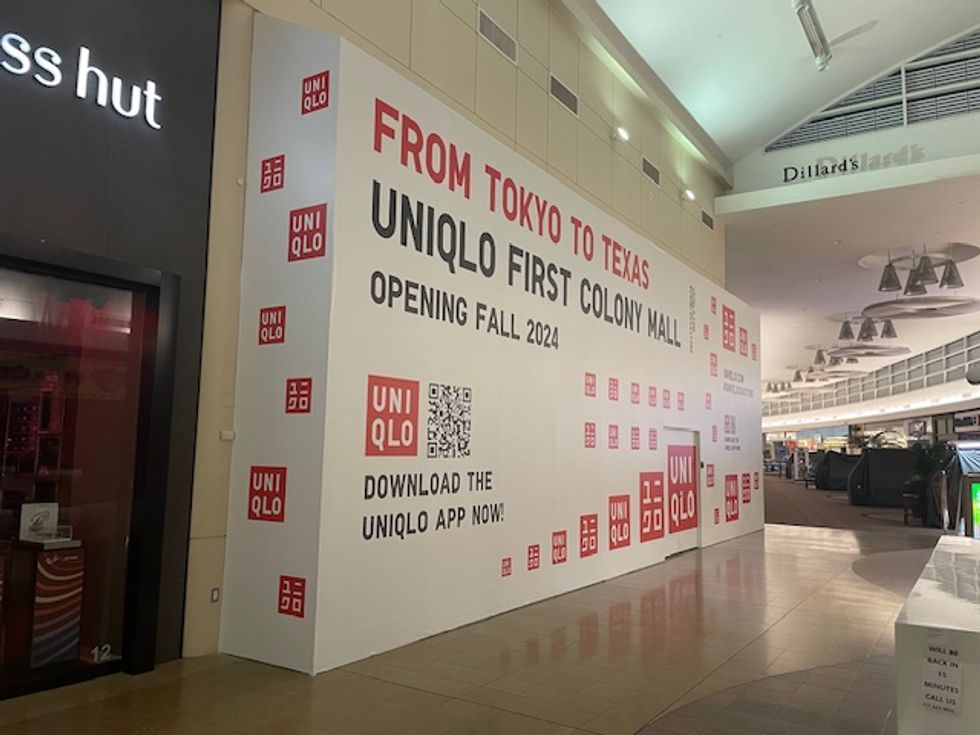 Uniqlo First Colony Mall store covered in paneling that says "Opening Fall 2024."