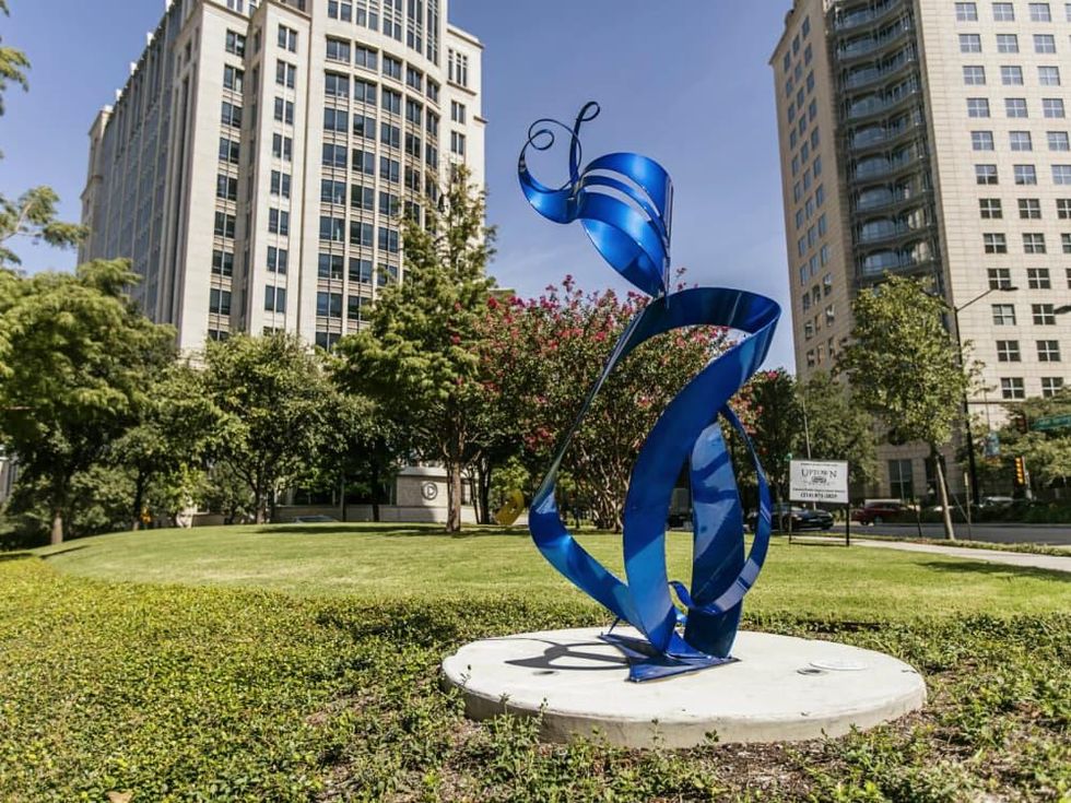 Uptown Dallas sculpture in park
