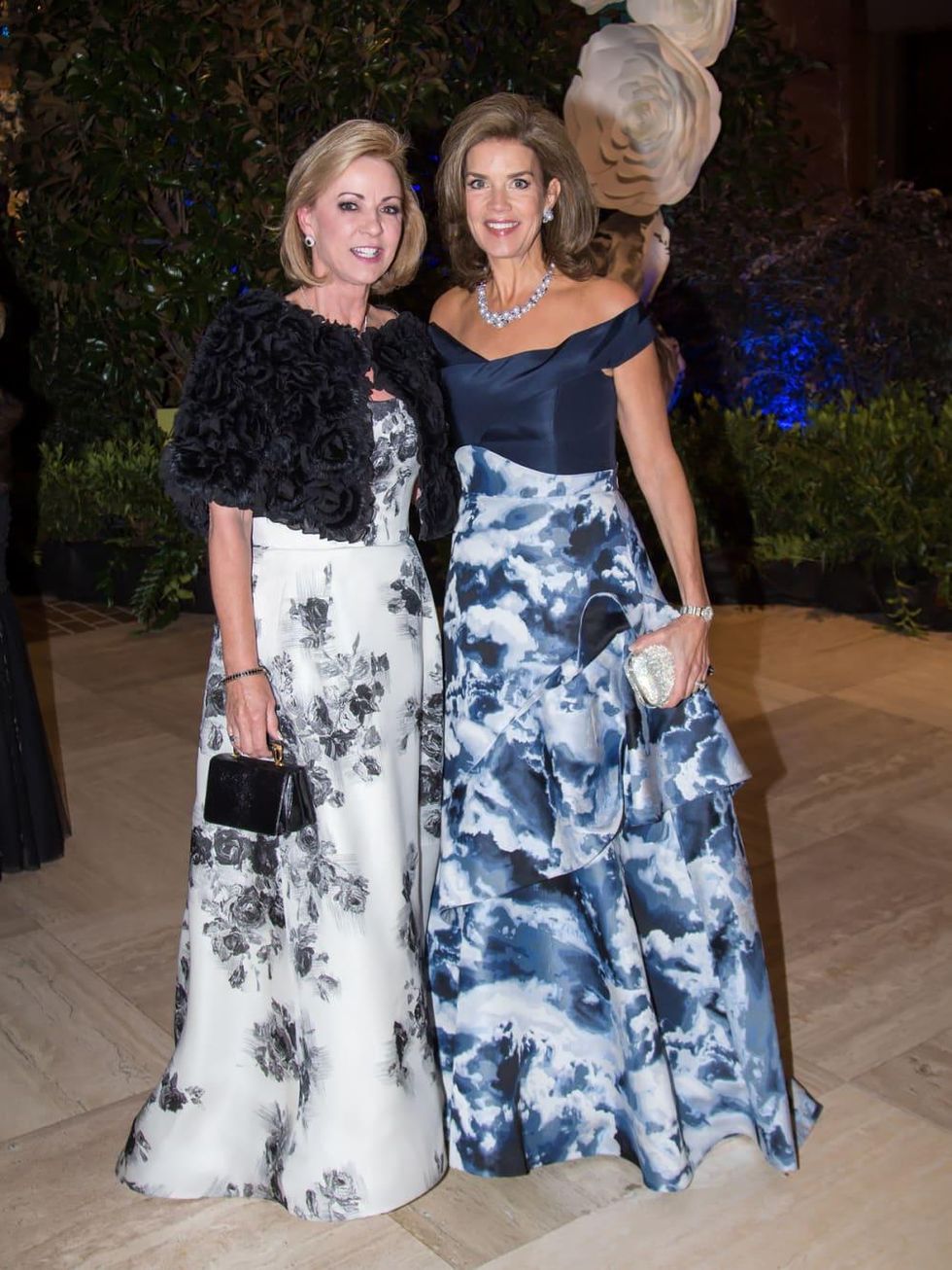 Vicki Chapman in Oscar de la Renta, Lisa Troutt in Carolina Herrera