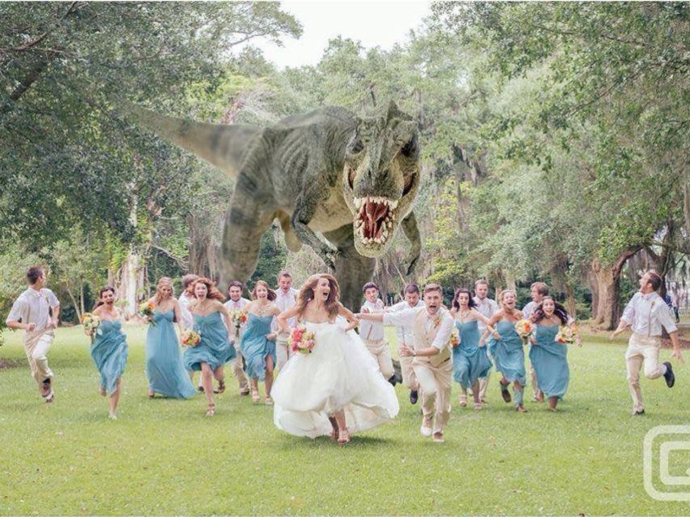 Wedding party runs from a dinosaur