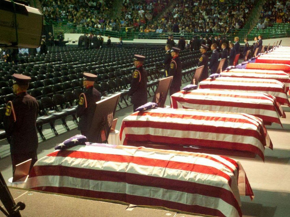 West, Texas memorial caskets in row April 2013