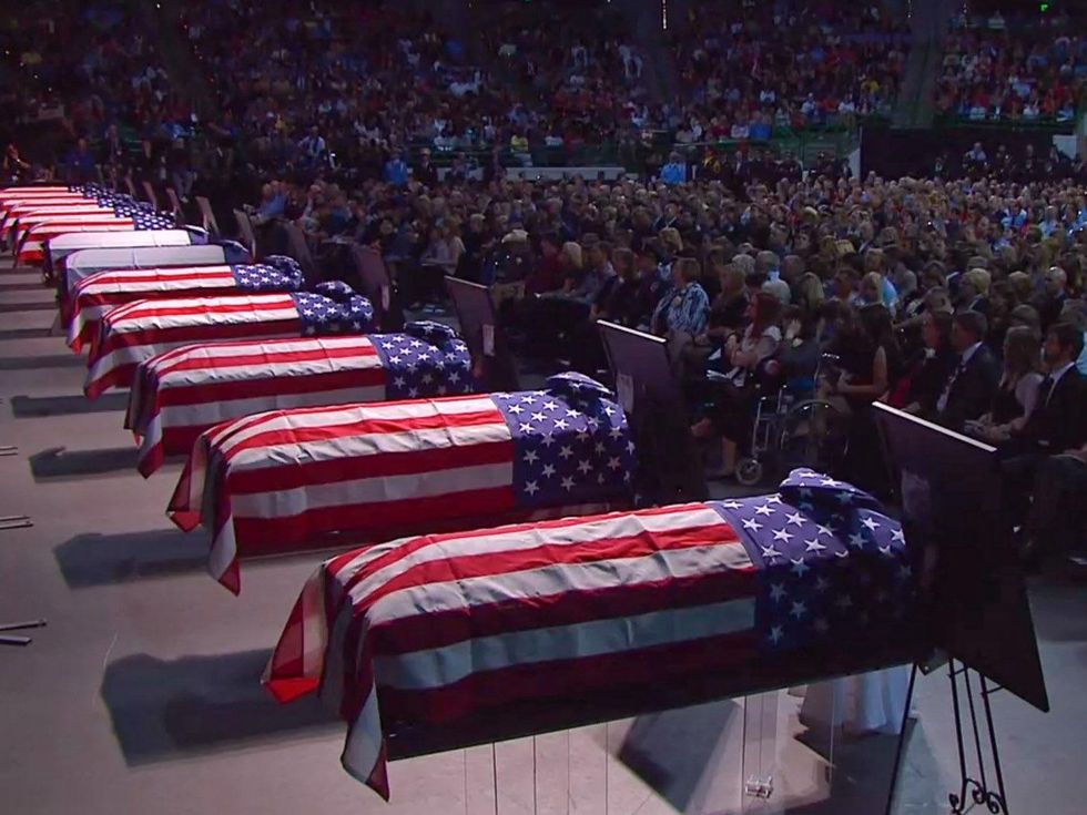 West, Texas, memorial service April 2013 caskets with flags during service