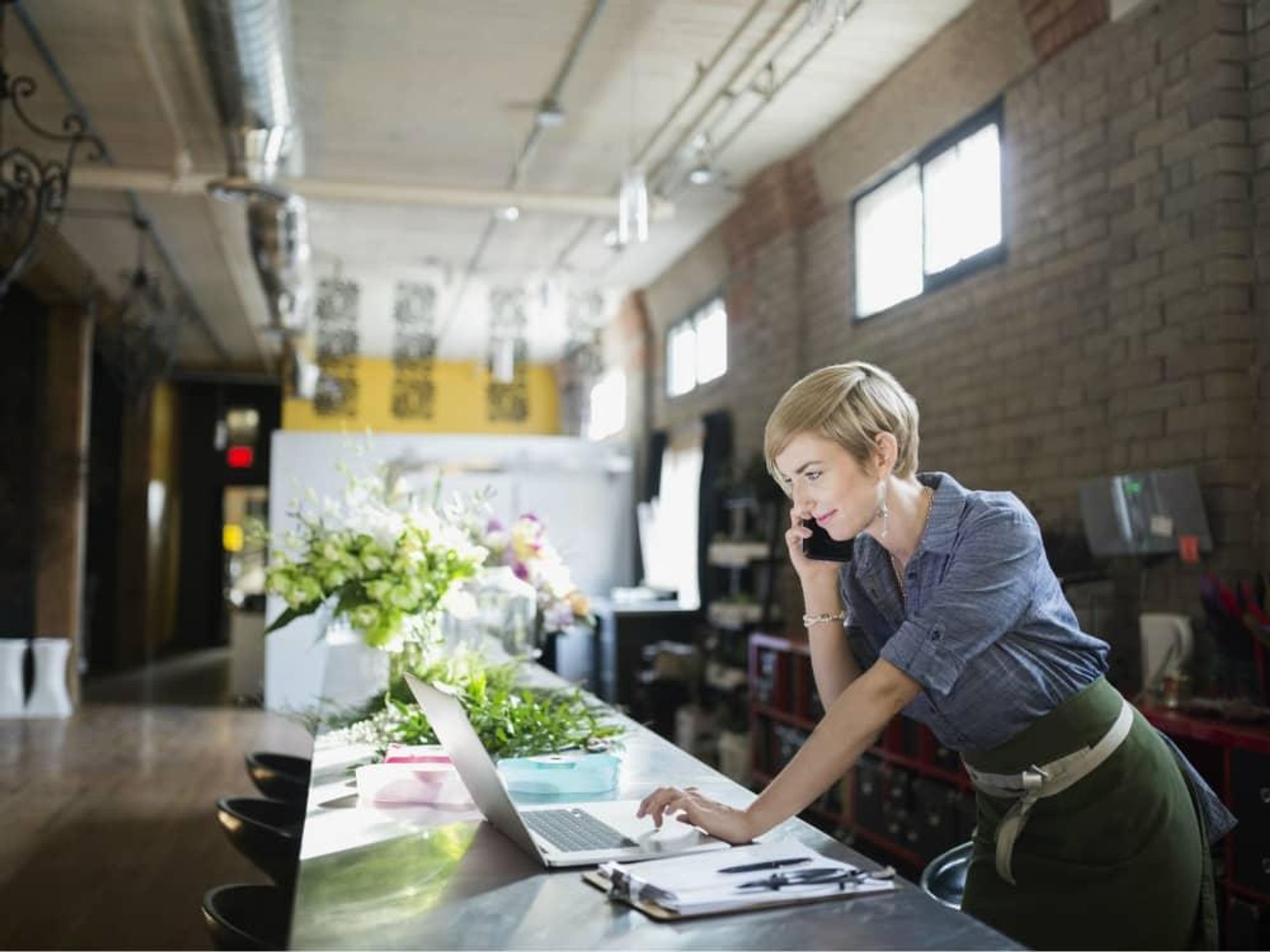 Woman looking at her laptop computer