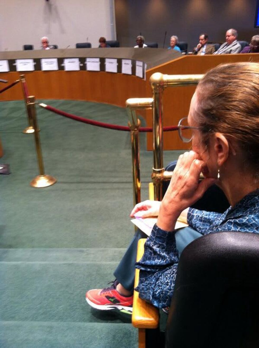 Woman wearing Wendy Davis sneakers at Dallas City Hall